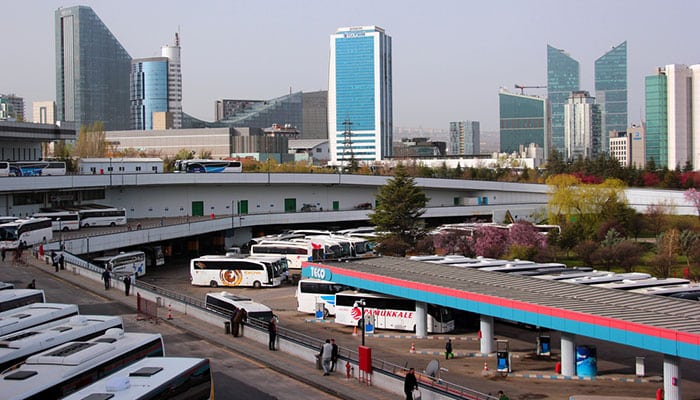 Ankara ASTI Bus Terminal with high buildings behind