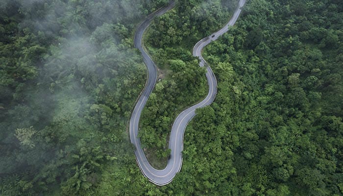 Mountain road to Pai in rainy and foggy day.