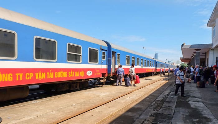 Passenger drop off and people waiting on the platform at Da Nang Railway Station