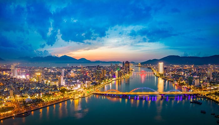 Aerial view of Dragon Bridge at sunset which is a very famous destination of Da Nang city.