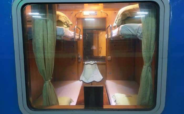 Interior of a Vietnamese sleeper train. The photo is taken through the train window from outside of the train.