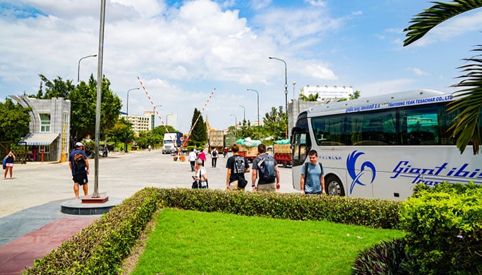 Giant Ibis bus with passengers at Krong Bavet-Moc Bai border crossing