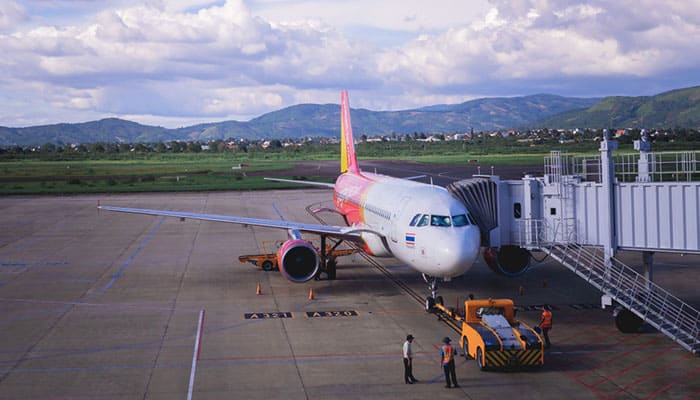 A passenger airplane of Vietjet Air docking at Lien Khuong Airport (DLI) in Dalat, Vietnam.