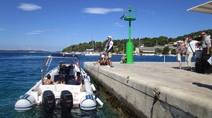 RIB small fast boat in the harbor of Hvar, Hvar Island, Split-Dalmatia, Croatia.